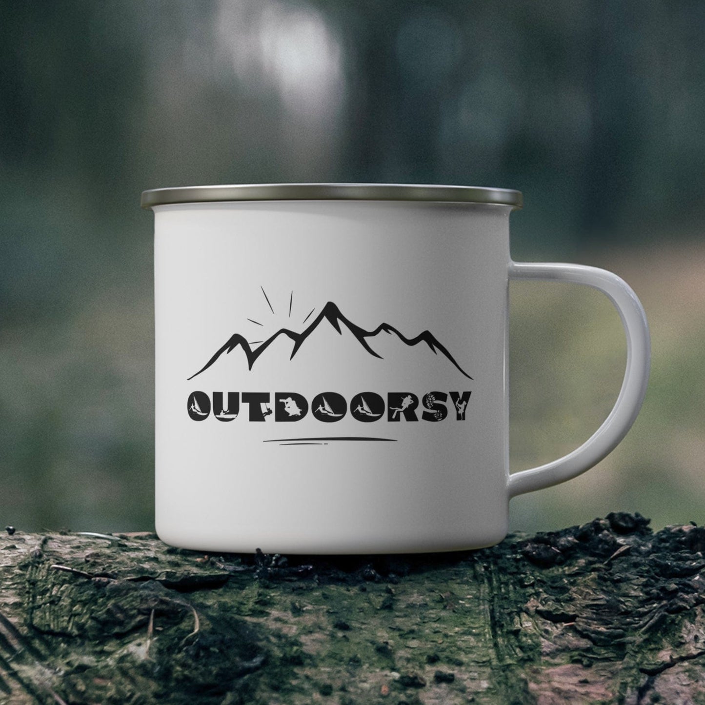 White mug with 'Outdoorsy' design on a log in a forest setting