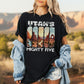 Person wearing a black t-shirt with 'Utah's Mighty Five' design in an outdoor setting.