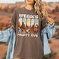 Person wearing a brown t-shirt with 'Utah's Mighty Five' graphic design.