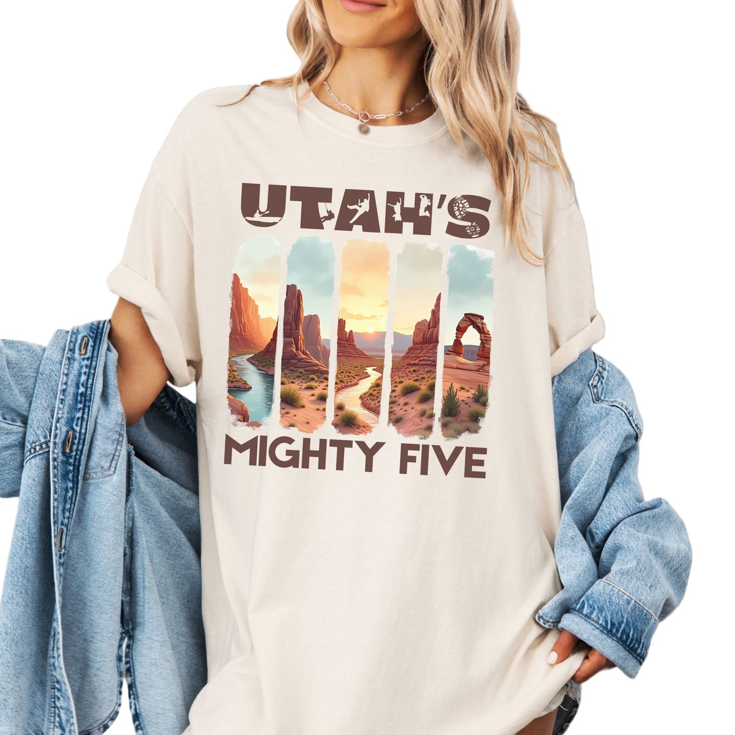 Person wearing a t-shirt with 'Utah's Mighty Five' design.