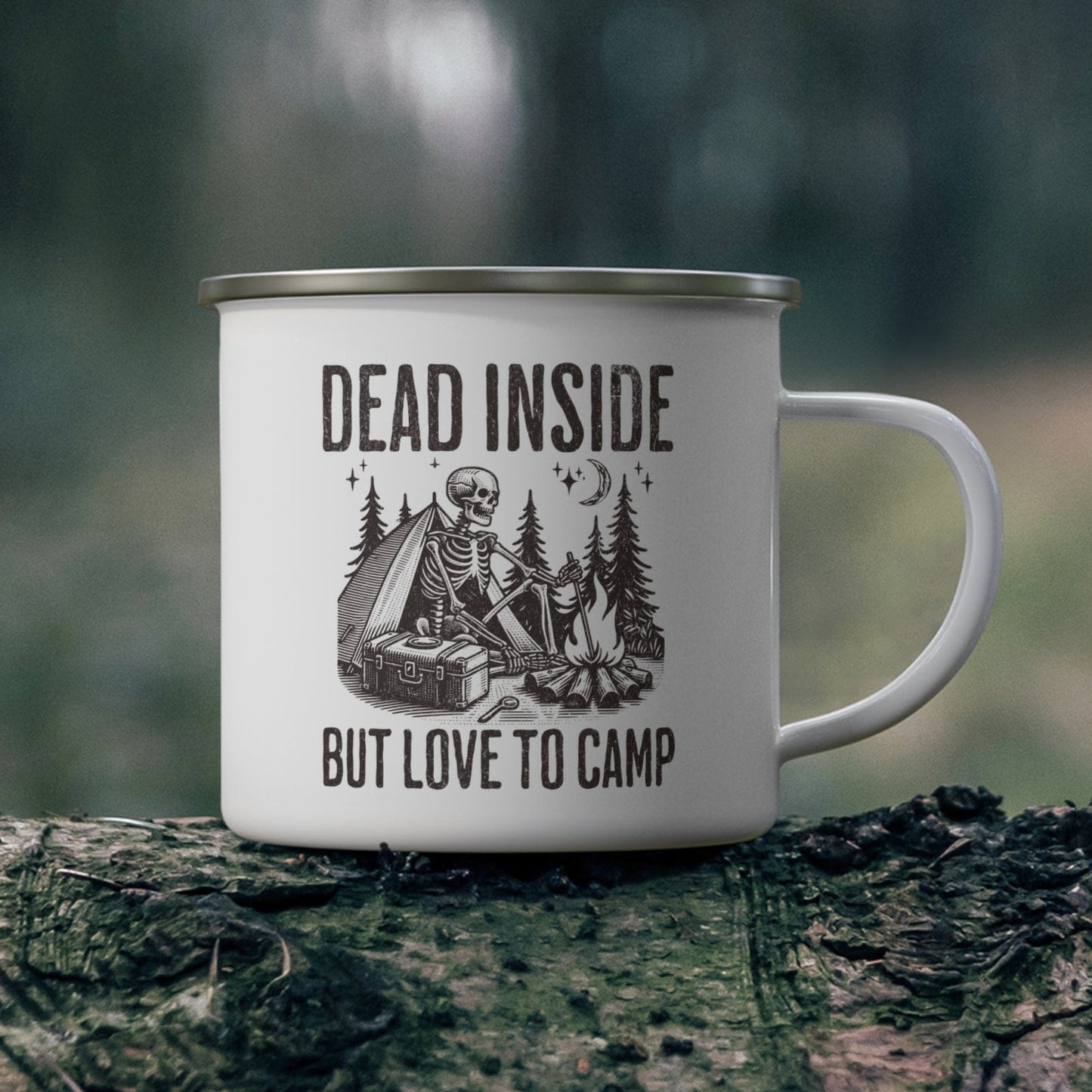 Mug with 'Dead Inside But Love to Camp' text and graphic on a forest background