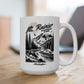 White mug with black mountain and moose design on a wooden surface