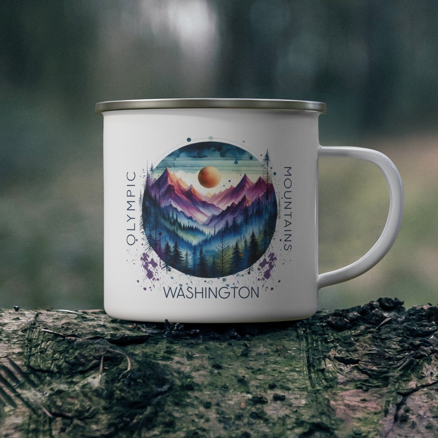 Mug with Olympic Mountains design on a log in a forest setting