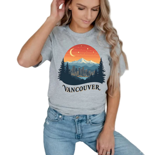 Person wearing a gray t-shirt with a Vancouver design.
