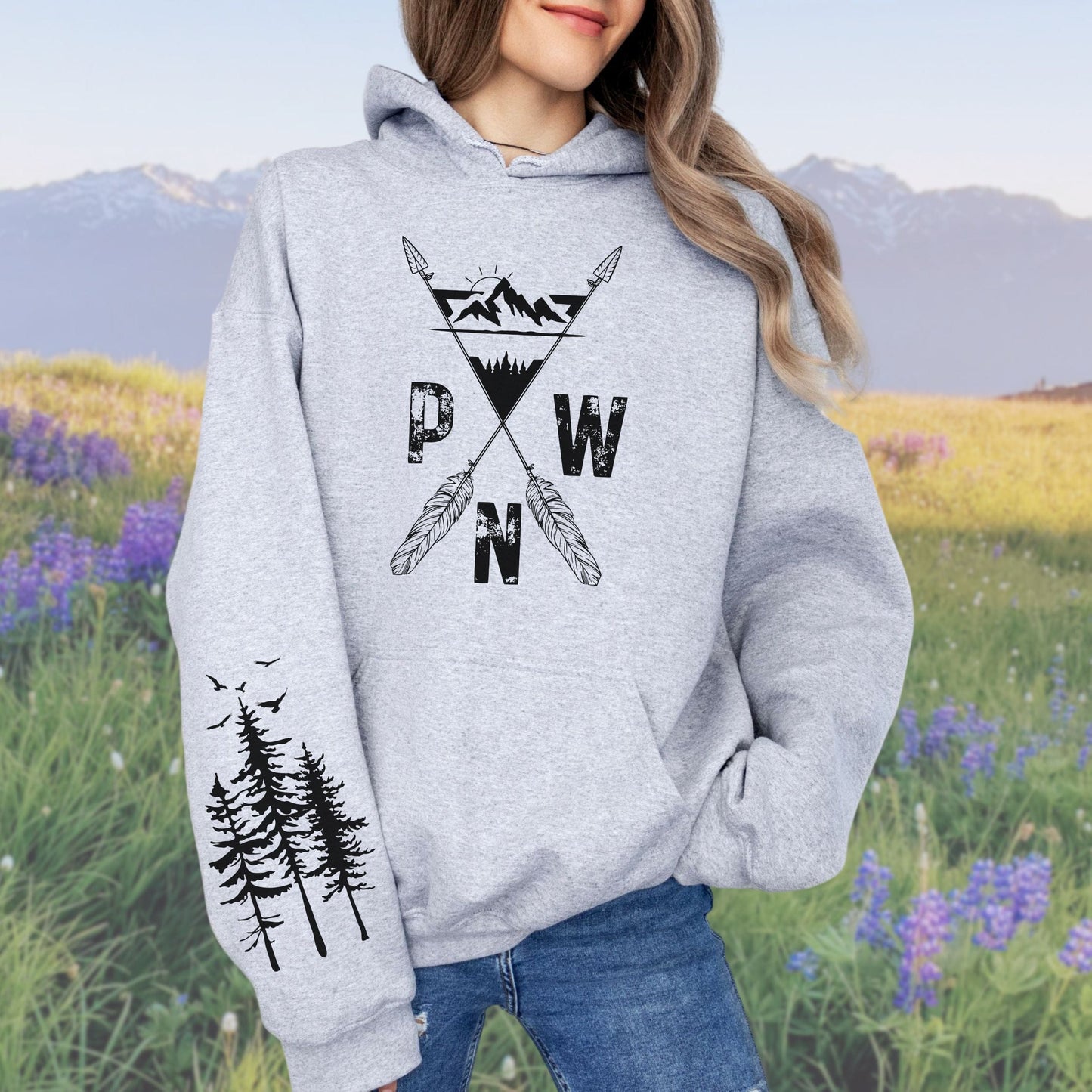 PNW Arrows and Mountains Softstyle Hoodie with Pine Trees Sleeve Design