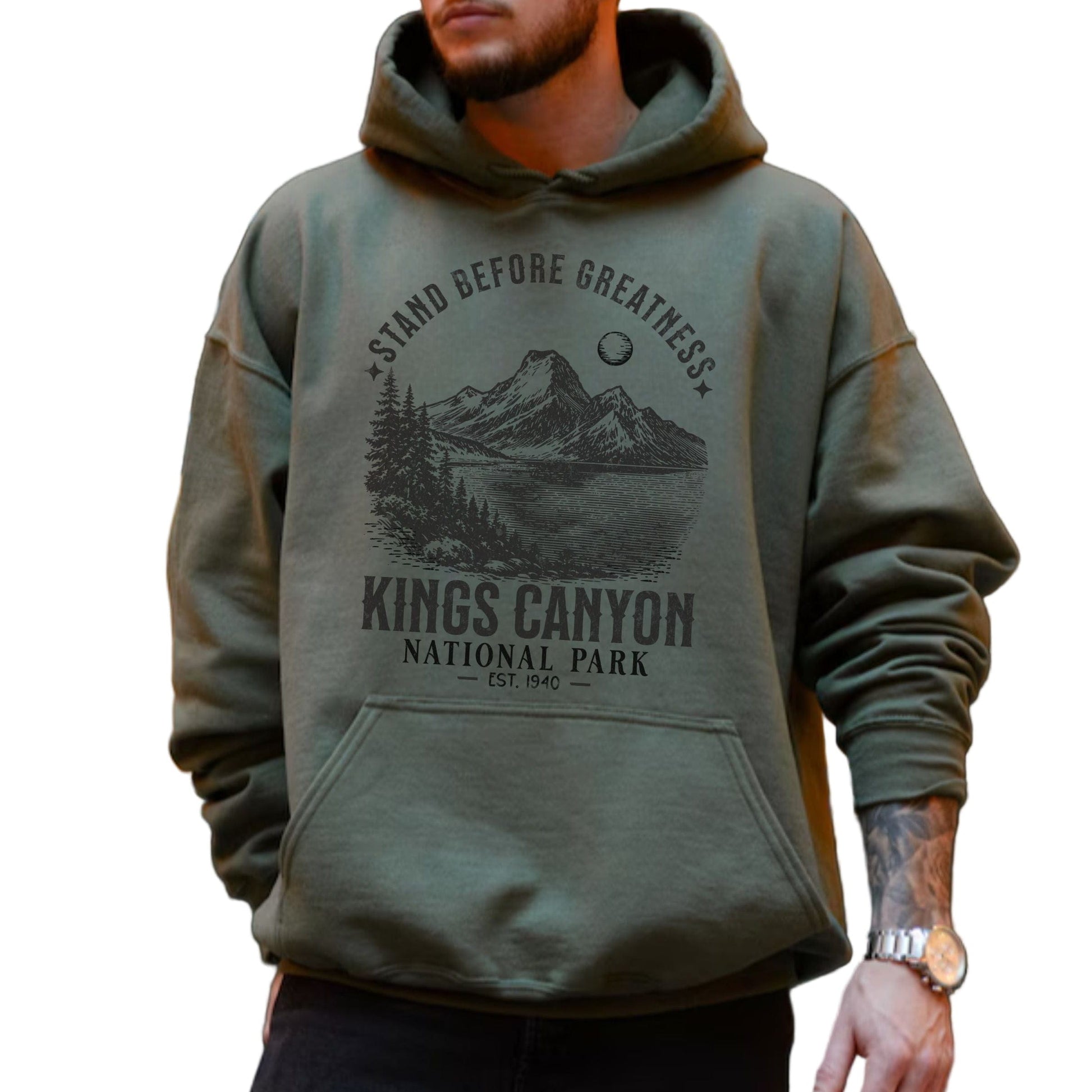 Person wearing a green hoodie with Kings Canyon National Park design.