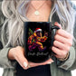 A person holding a black ceramic mug with a colorful graphic of a Santa-clad dancing bear and the text 'Pacific Northwest' on the front.