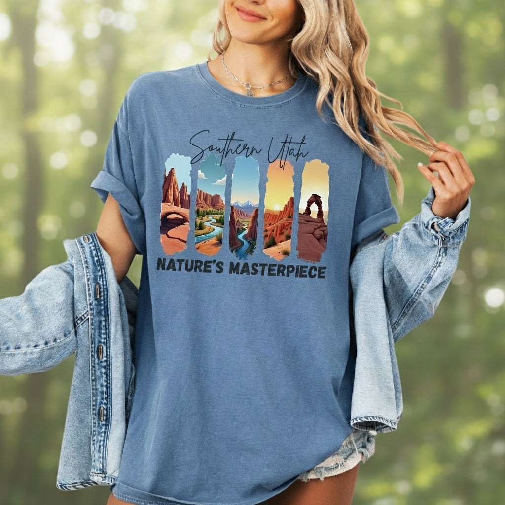 Person wearing a blue t-shirt with 'Southern Utah Nature's Masterpiece' design
