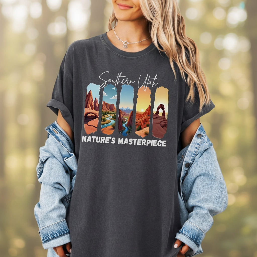 Person wearing an off black t-shirt with 'Southern Utah Nature's Masterpiece' design